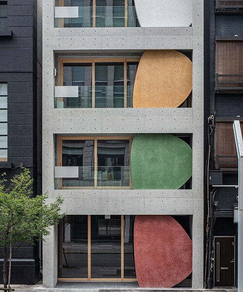 sculptural ovals shape seismic retrofit of 50-year-old building in japan by C+A